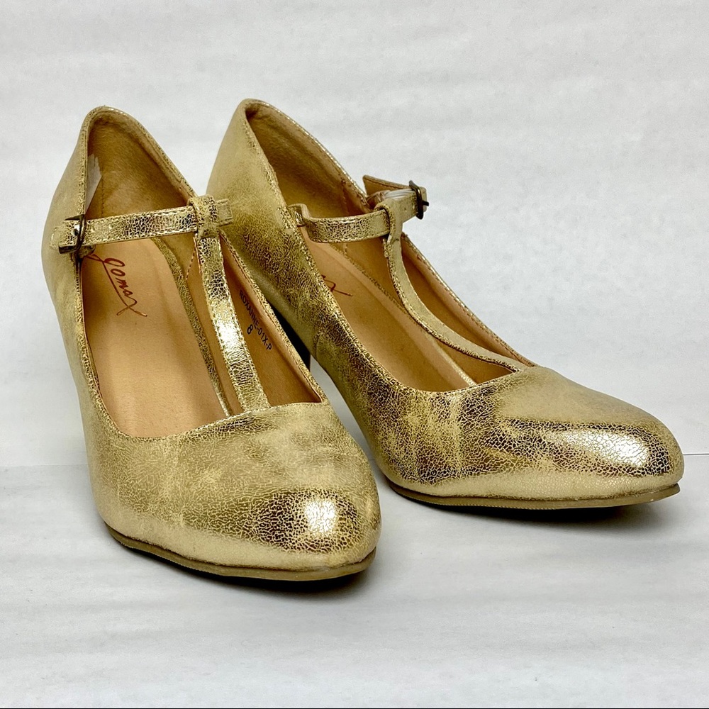From ModCloth. Gold t-strap heels / 8